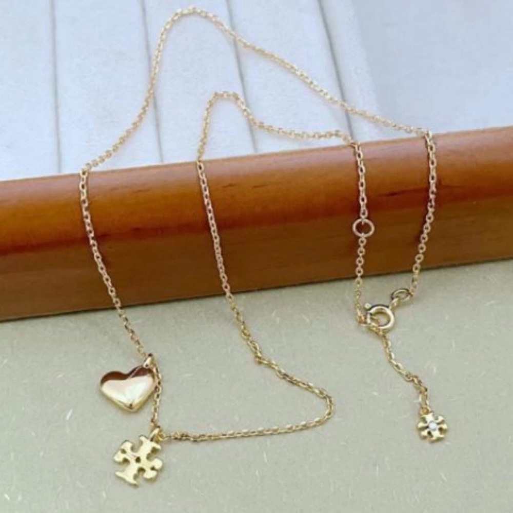 Tory burch Gold Heart and Puzzle Pendant Necklace - Picture 7 of 10